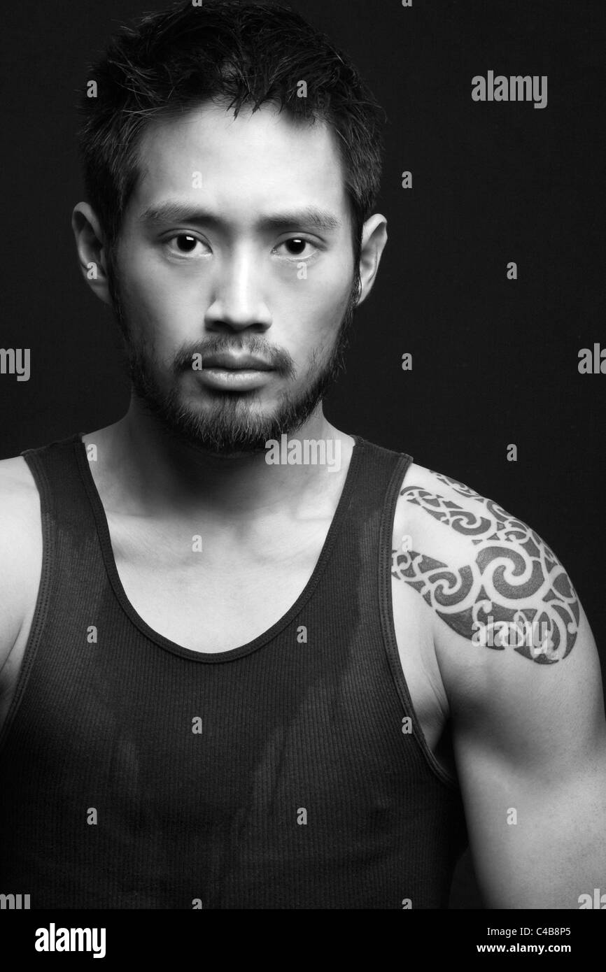 Chinese man with tattoo hi-res stock photography and images - Alamy