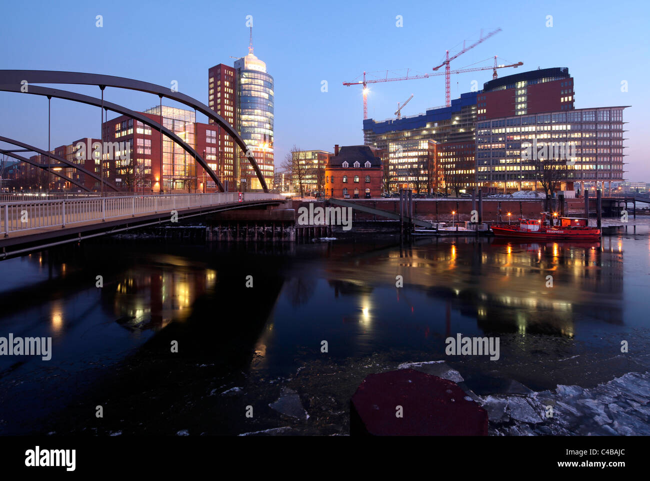 The Hanseatic Trade Center in Hamburg is a modern office building in the borough Speicherstadt, Germany Stock Photo