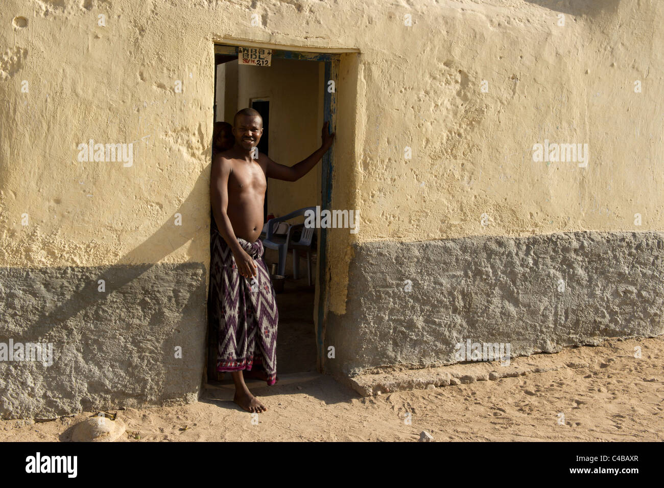 Man outside his house, Berbera, Somaliland, Somalia Stock Photo