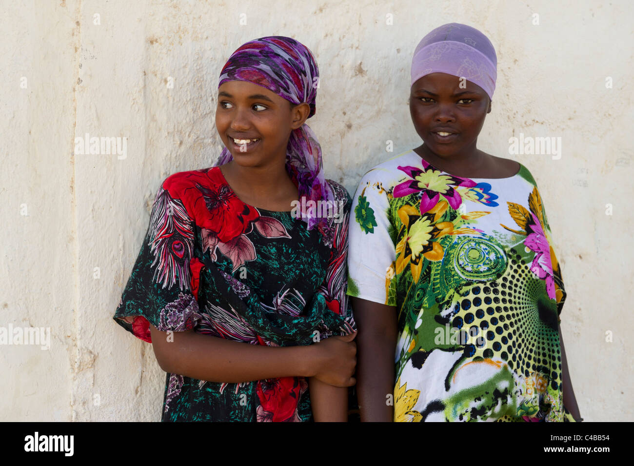Girls outside their house, Berbera, Somaliland, Somalia Stock Photo