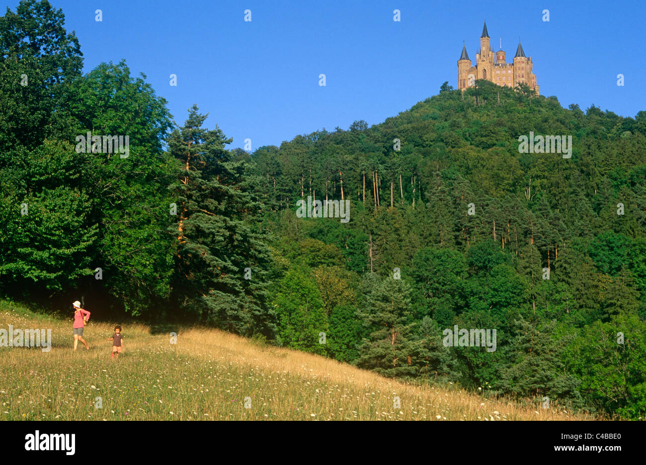 Germany, Baden-Wurttemberg, Swabia, Hechingen. Situated in the foothills of the Swabian Alps, Hohenzollern Castle was the medieval ancestral seat of the Hohenzollerns who became Germany's emperors. Built in the mid-1800s for Frederick William IV of Prussia, the existing castle is a popular tourist attraction. Stock Photo