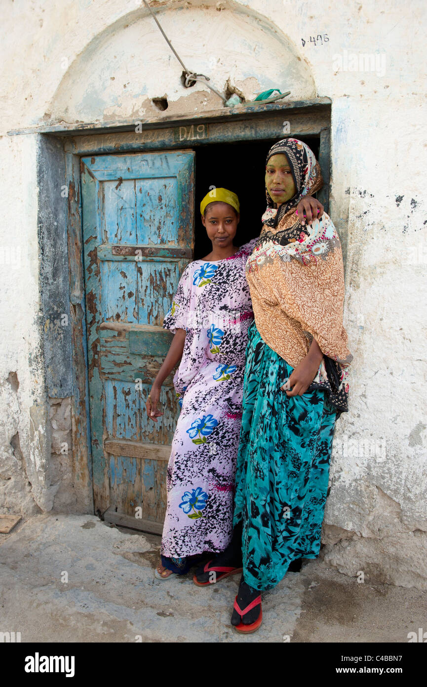 Women outside their house, Berbera, Somaliland, Somalia Stock Photo