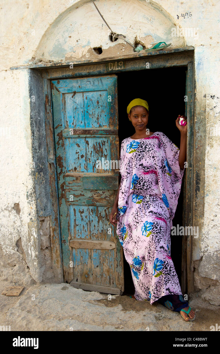 Woman outside her house, Berbera, Somaliland, Somalia Stock Photo