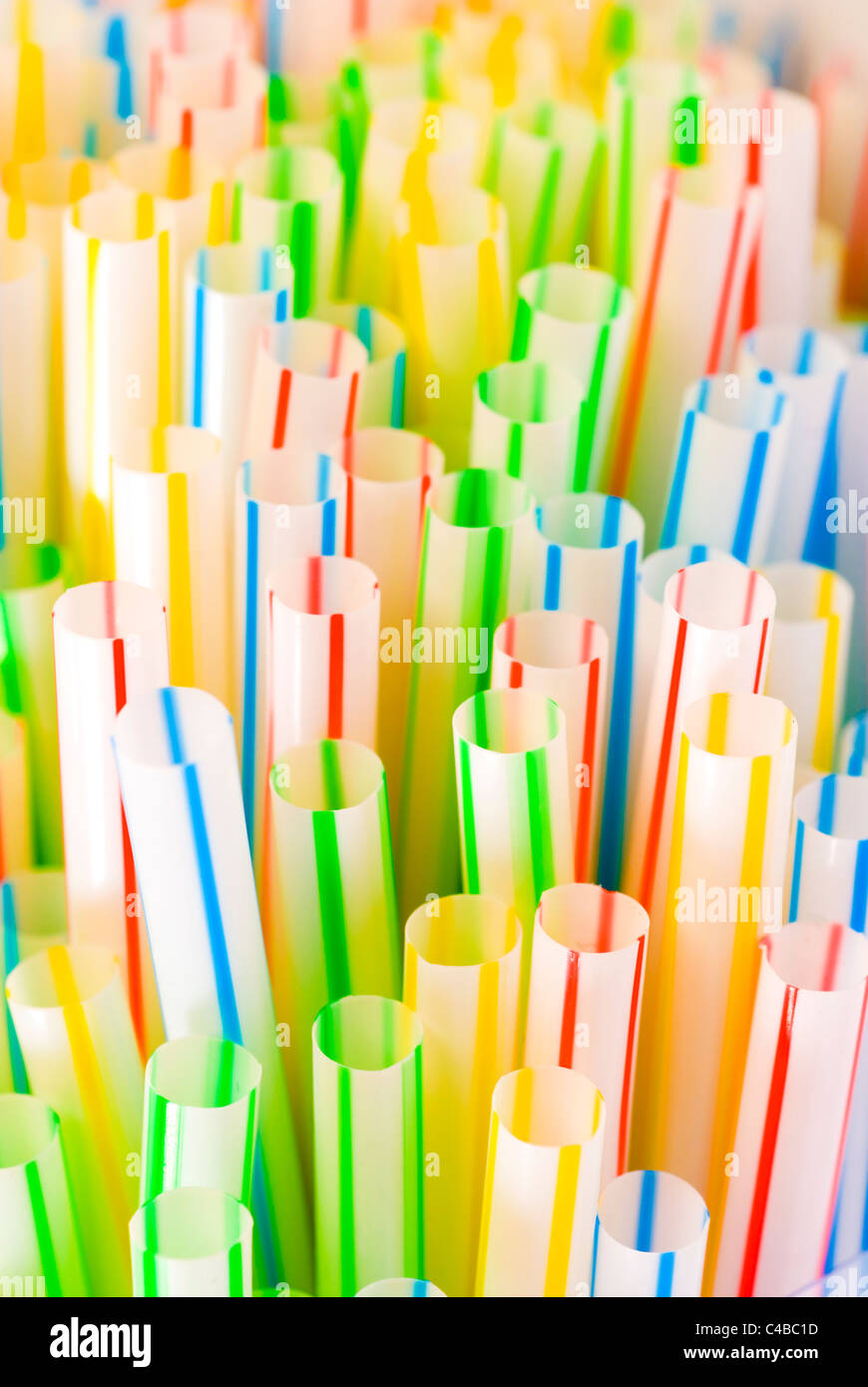 Coloured stripy bendy drinking straws isolated on a white background Stock Photo