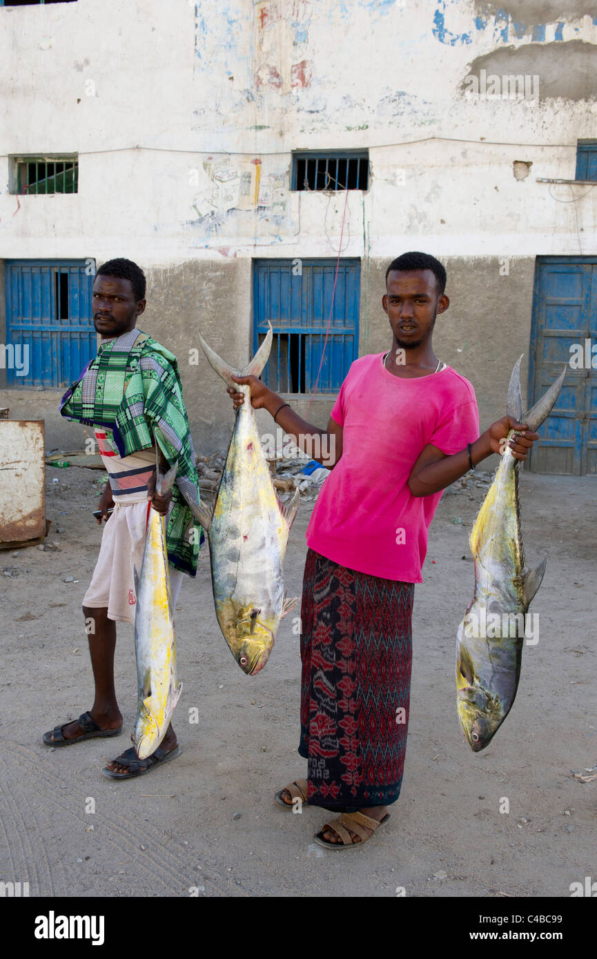 Fishermen with their catch, Berbera, Somaliland, Somalia Stock Photo