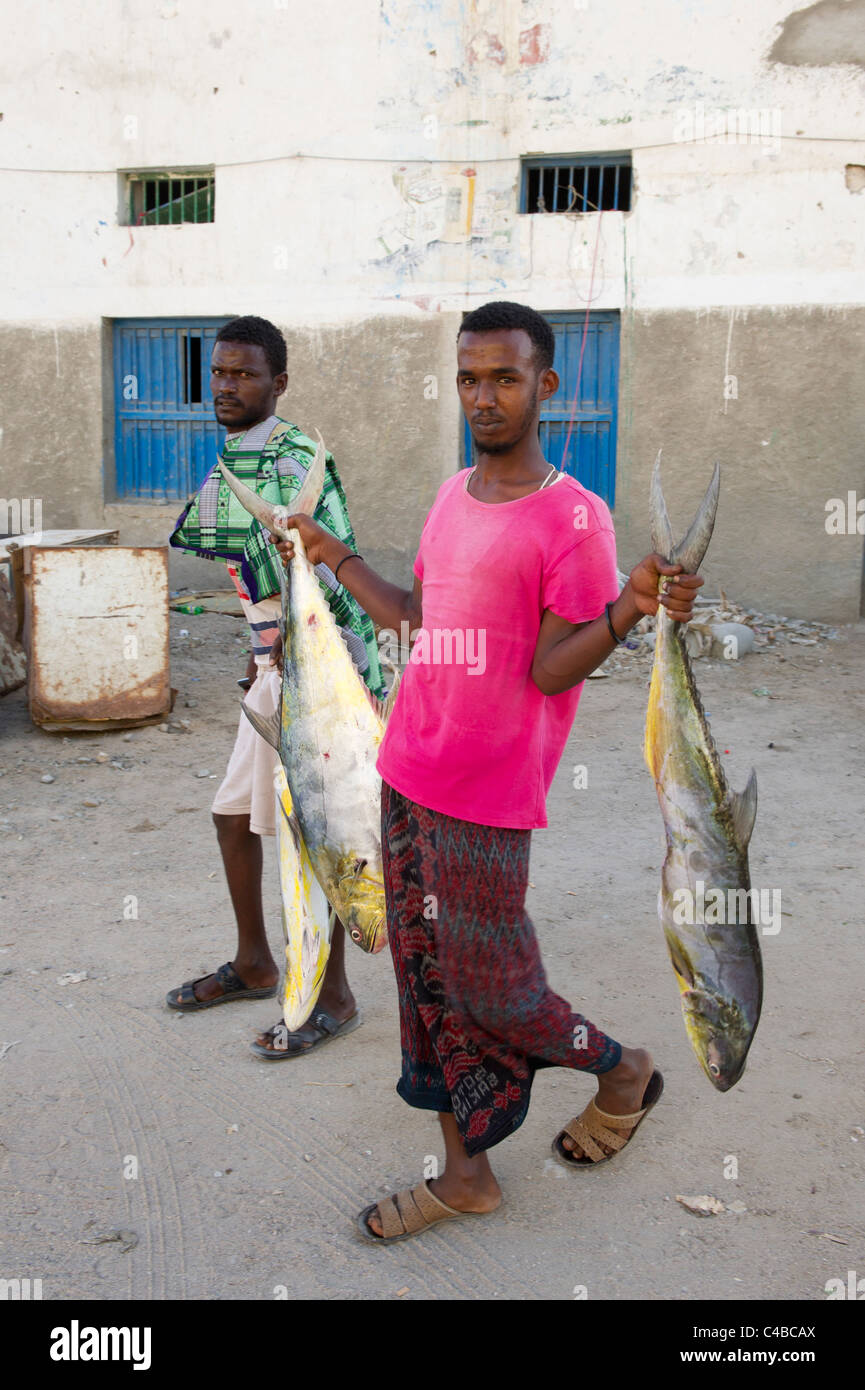 Fishermen with their catch, Berbera, Somaliland, Somalia Stock Photo