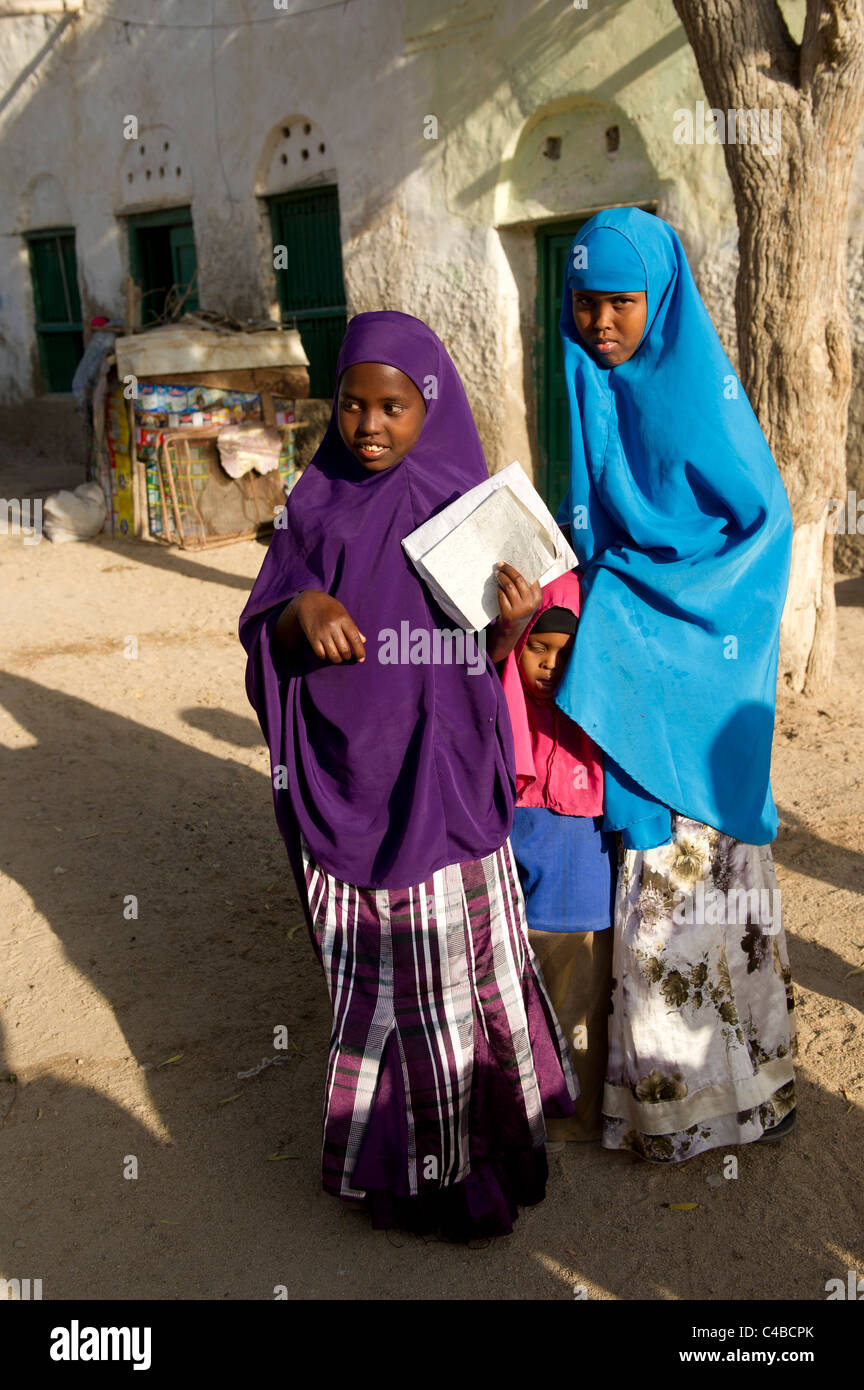 Muslim girls walking to school, Berbera, Somaliland, Somalia Stock Photo
