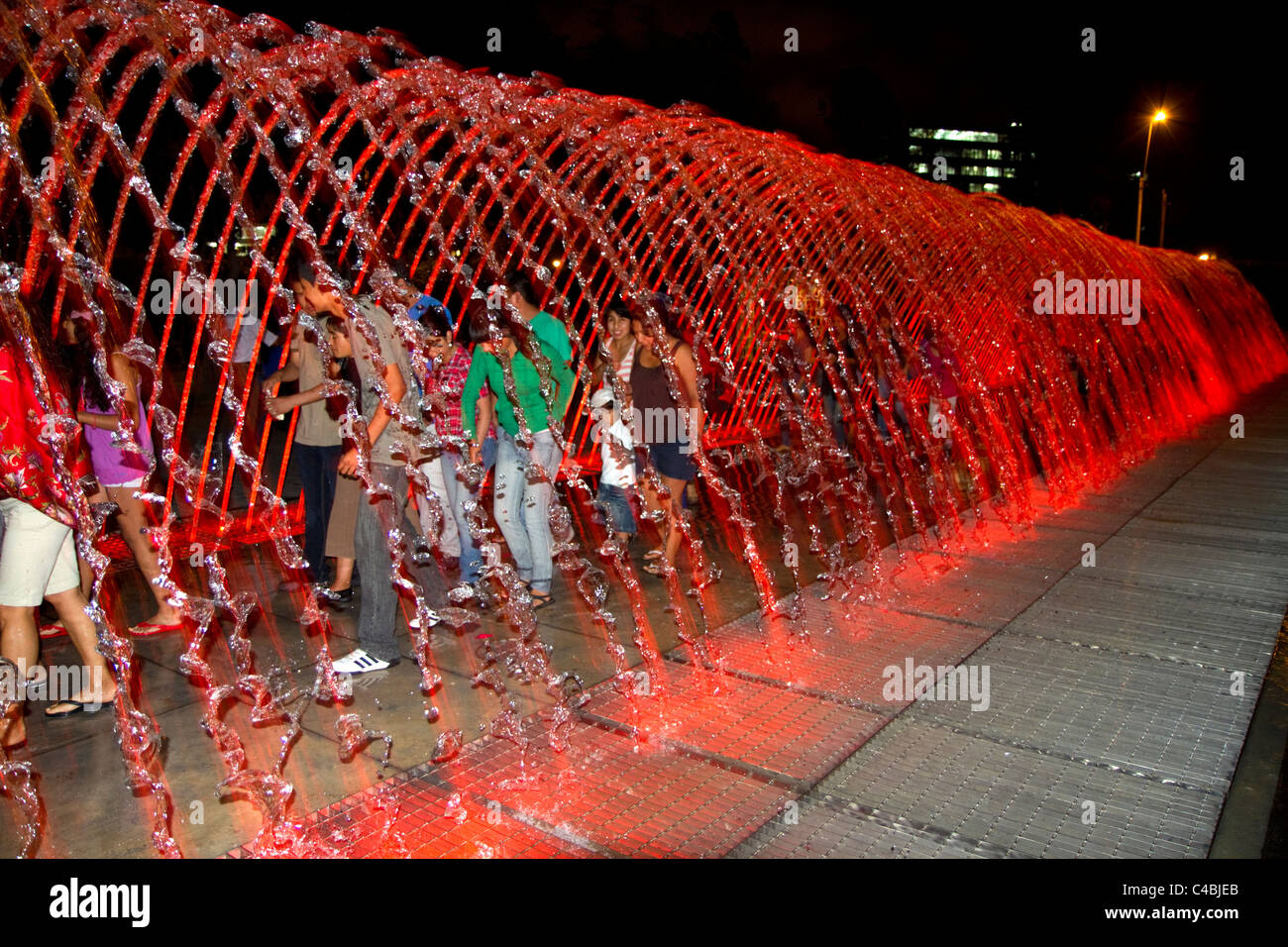 Water fountains light up at night in the Magic Circuit of Water park in Lima, Peru. Stock Photo