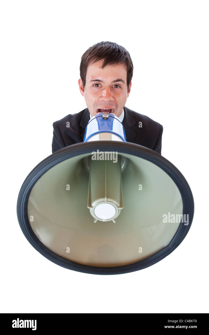 Closeup of a businessman roaring loudly into megaphone.Isolated on white background. Stock Photo