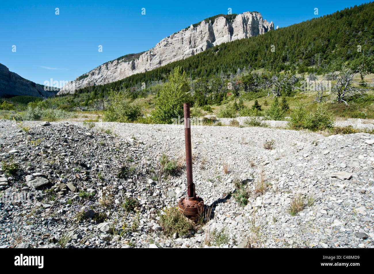 An abandoned gas well along the Rocky Mountain Front  this well sits in the Blackleaf Wildlife Management Area near Muddy Creek. Stock Photo