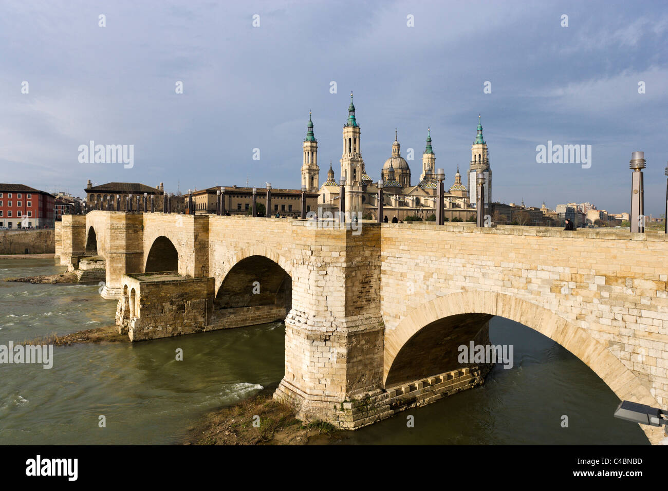View of the Basilica of Nuestra Senora del Pilar and the Puente de Piedra on the River Ebro, Zaragoza, Aragon, Spain Stock Photo