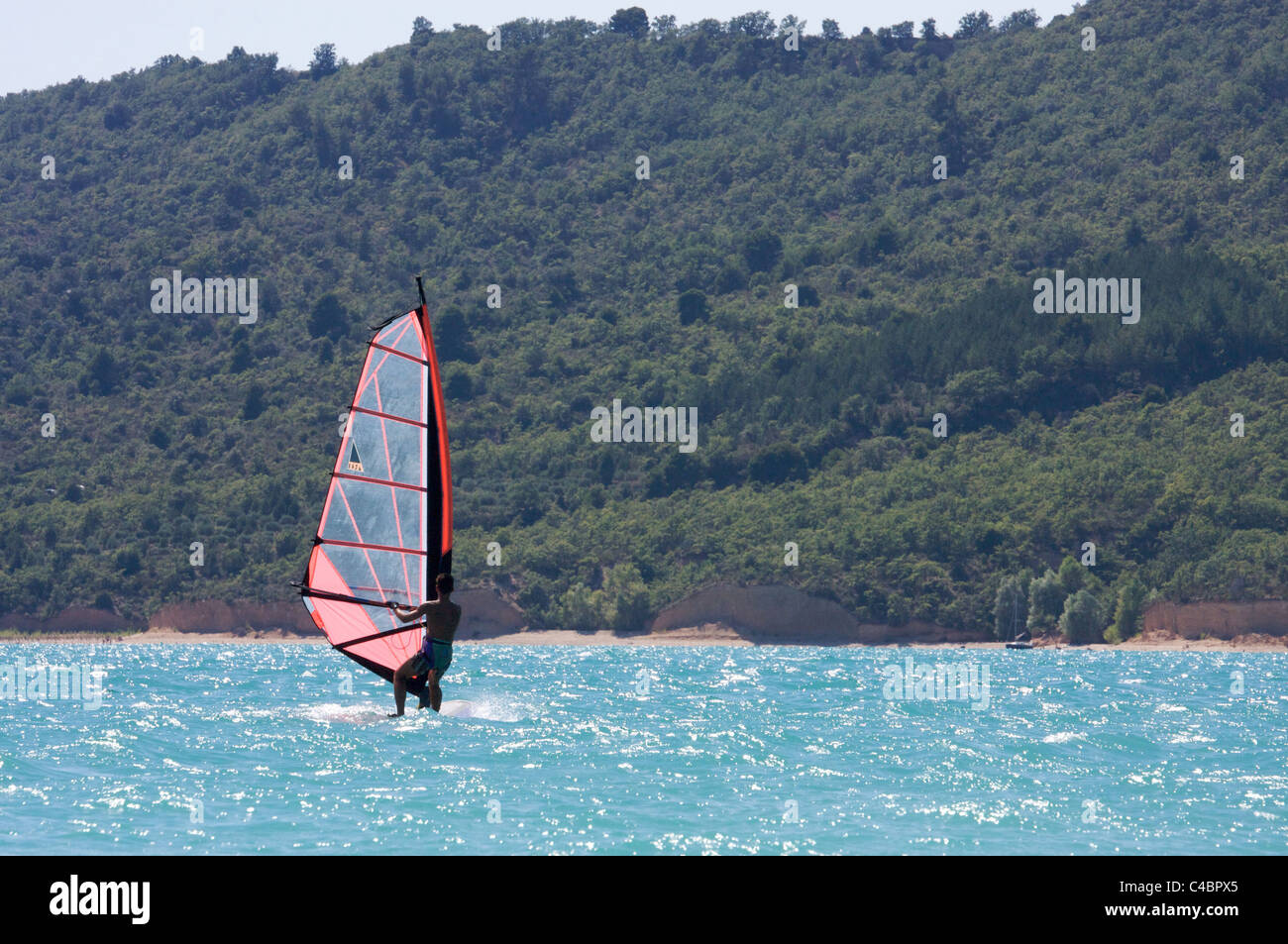 water sports on the lake of Sainte-Croix (canyon of Verdon, Provence),  one sail-boarder, sailboard Stock Photo