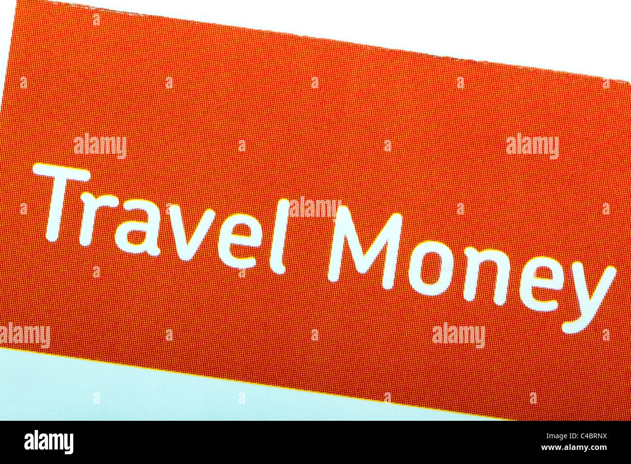 Travel money sign in orange with white writing Stock Photo