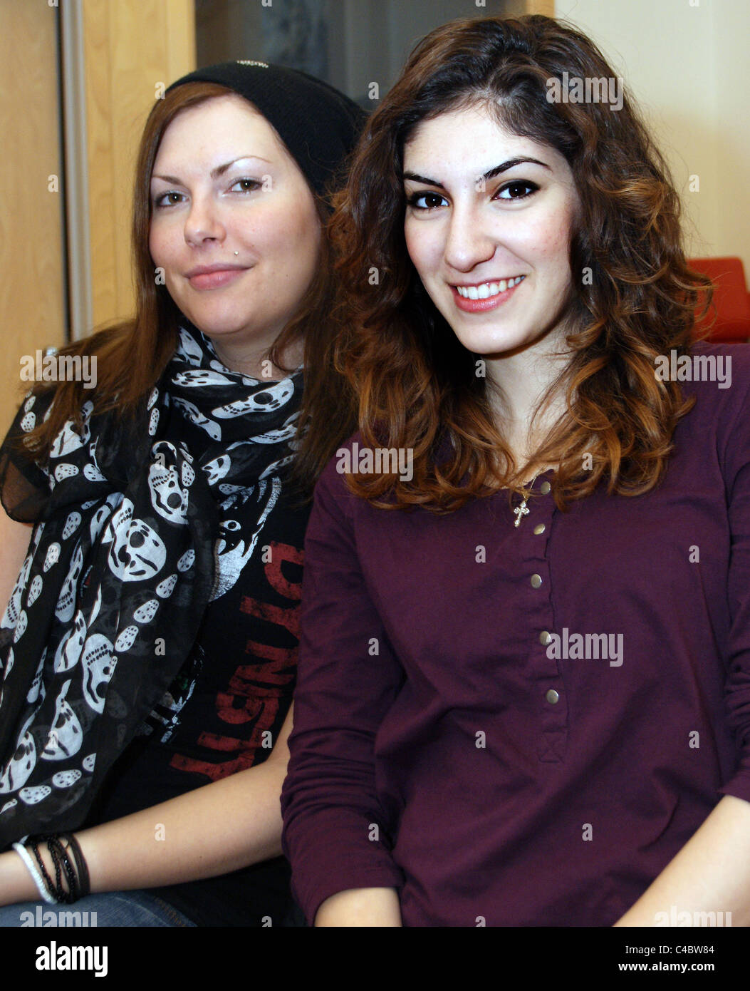 Two girls smiling hi-res stock photography and images - Alamy