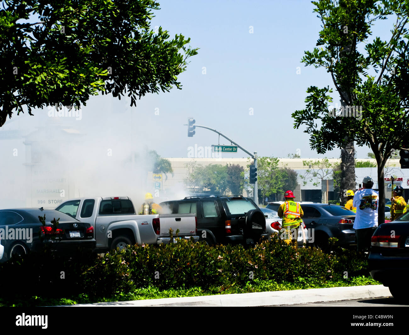 Firefighters working on an SUV fire in Oxnard California Stock Photo