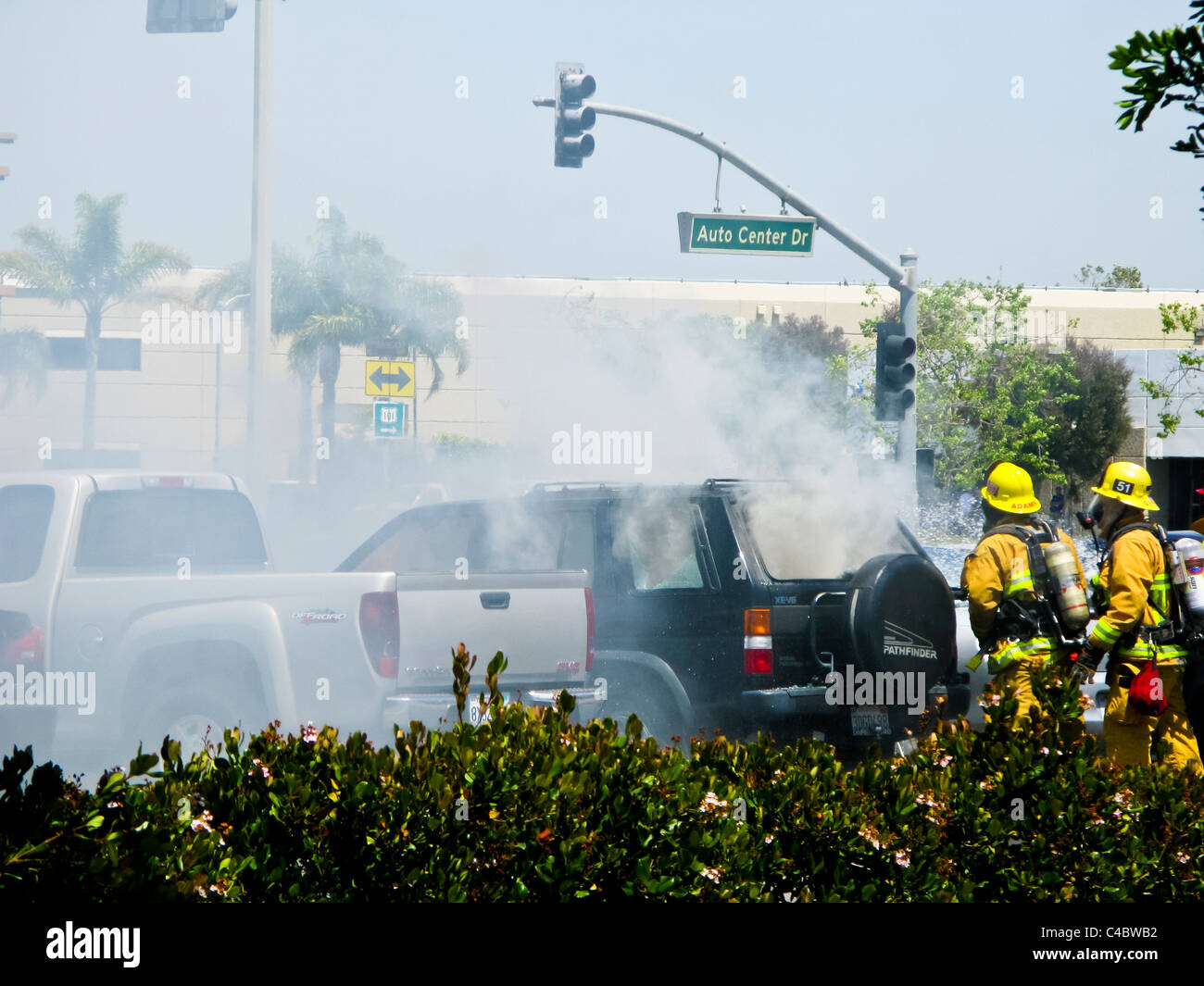 Firefighters working on an SUV fire in Oxnard California Stock Photo