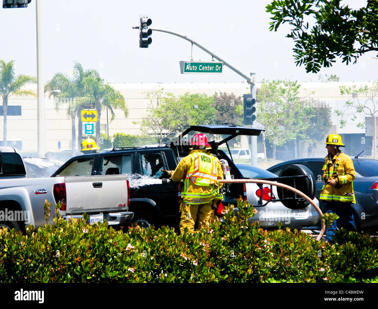 Firefighters working on an SUV fire in Oxnard California Stock Photo