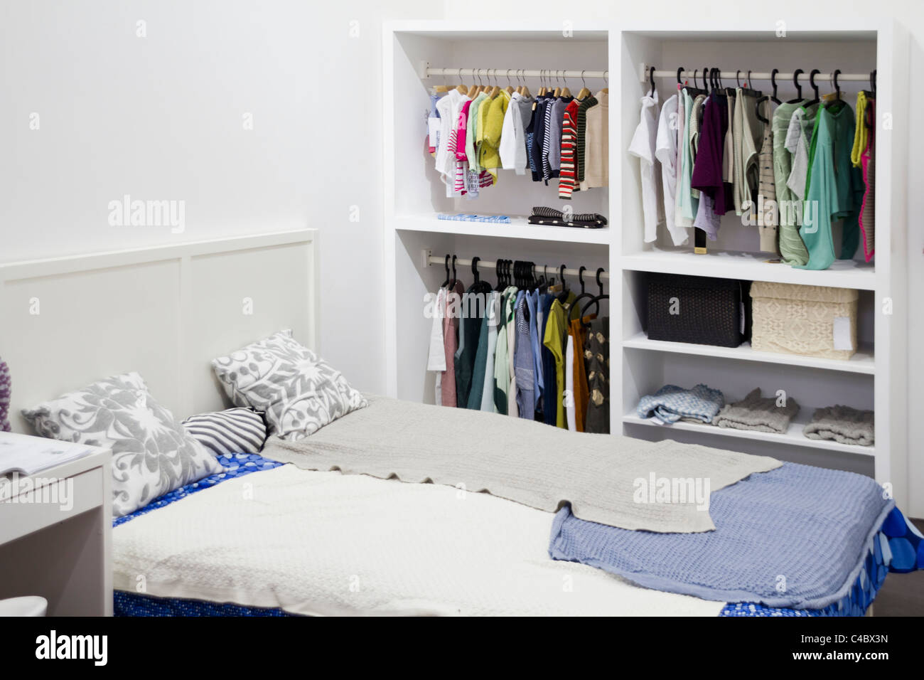 bedroom with large bed and garderobe Stock Photo - Alamy