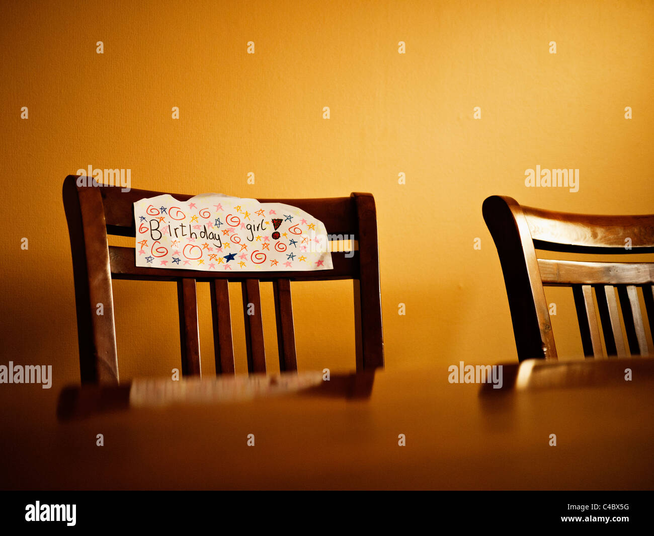 Birthday girl. Chair for mum decorated by her daughter. Stock Photo