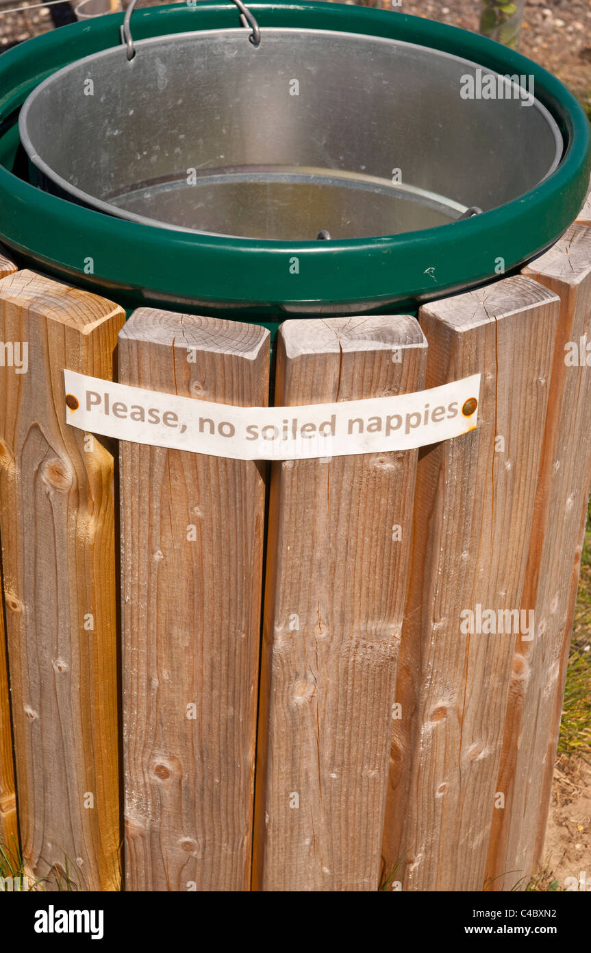 A bin with a sign reading please no soiled nappies in the Uk Stock Photo