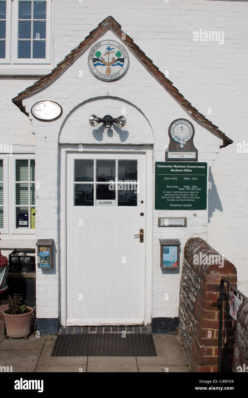 The door to the Harbour Masters Office in West Itchenor, West Sussex Stock Photo