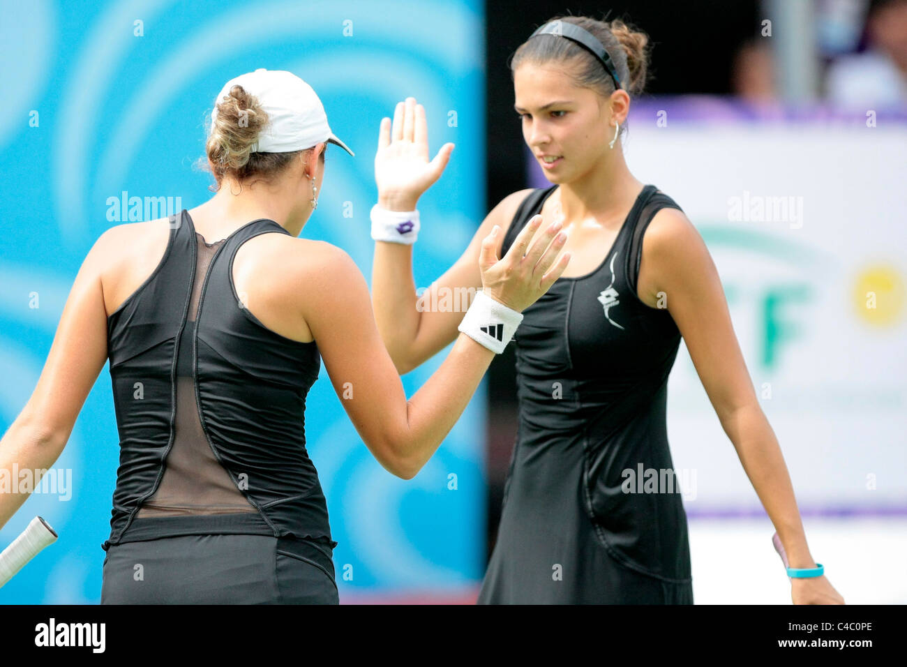 Team Slovakia's Jana Cepelova(left) and Chantal Skamlova(right) react after  winning a point in the Womens' Doubles Finals Stock Photo - Alamy