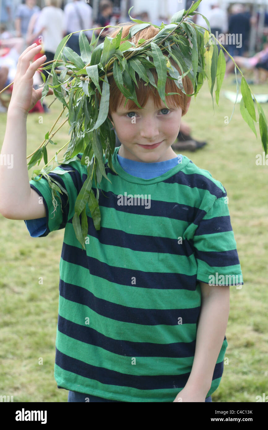 boy showing off his willow wreath at the Hay Literary Festival, 31 May, 2011 Stock Photo
