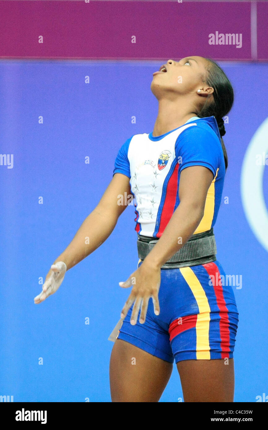 Venezuela's Genesis Rodriguez reacts after failing to lift 87 KG in her