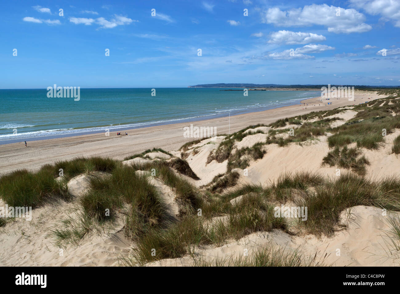 View over dunes and beach of Camber Sands Stock Photo