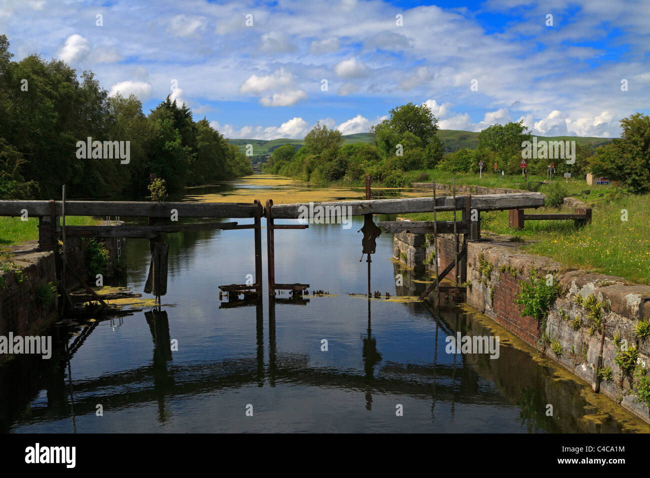 Derelict lock gates on the closed Ulverston Canal, Cumbria Stock Photo