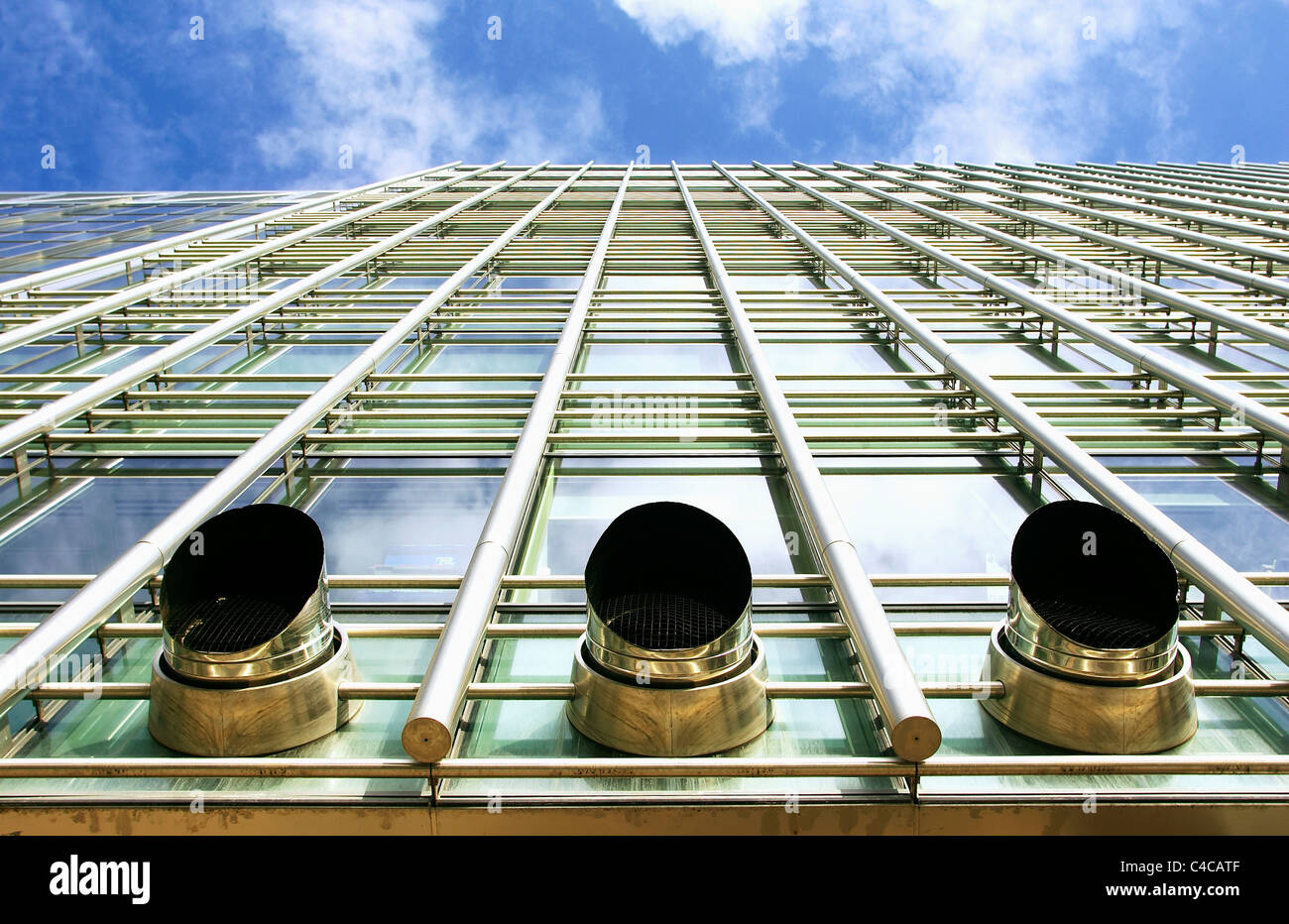 Exhaust ventilation pipes sticking out from the facade of a modern