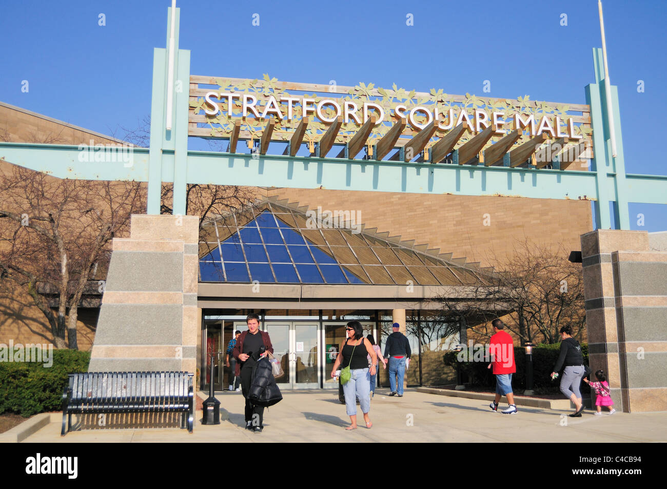 Shoppers entering and leaving a typical American shopping mall  Stratford Square Mall, Bloomingdale, Illinois Stock Photo