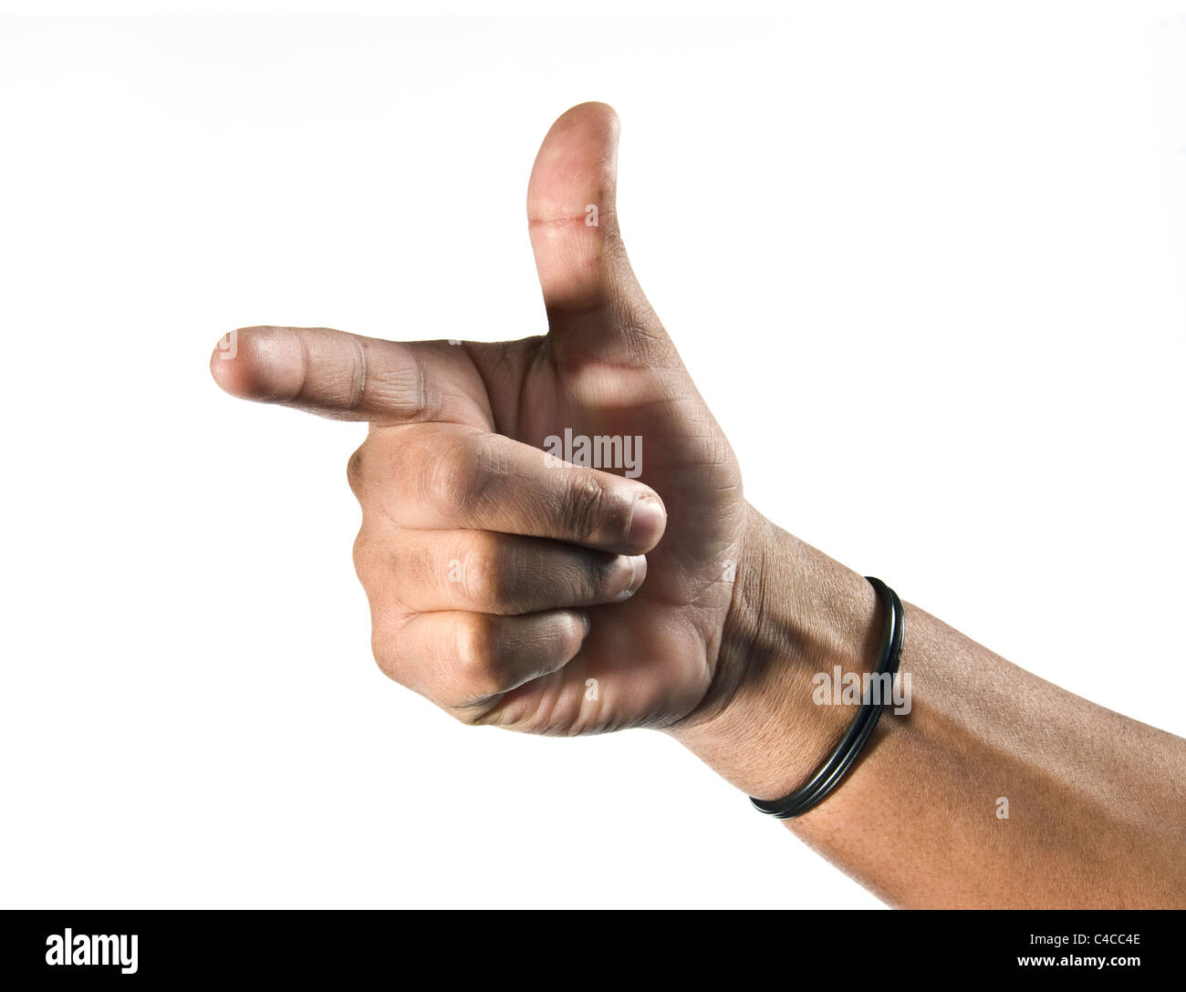 African hand with forefinger pointing in a direction and the thumb is up, fingers are folded into the palm.  Good luck leather Stock Photo