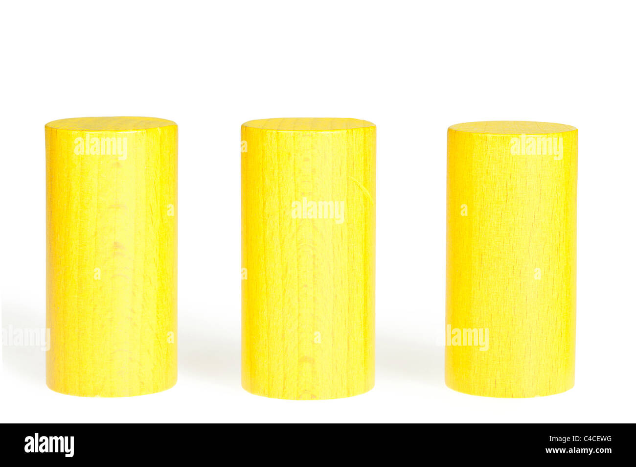 Wooden colour cylinders. It is isolated on a white background Stock