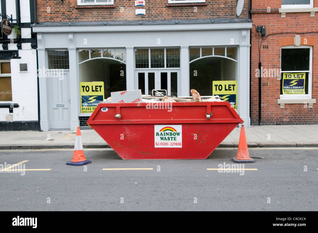 skip skips rubbish junk in throw away society trash landfill tax full