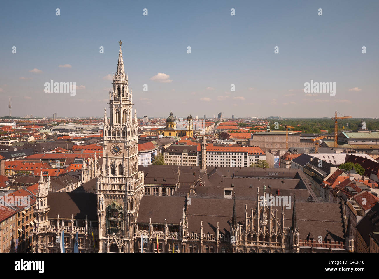 A view of the top of the New City Hall, Neues  Rathaus, with roof and towers of other buildings visible in Munich, Germany. Stock Photo