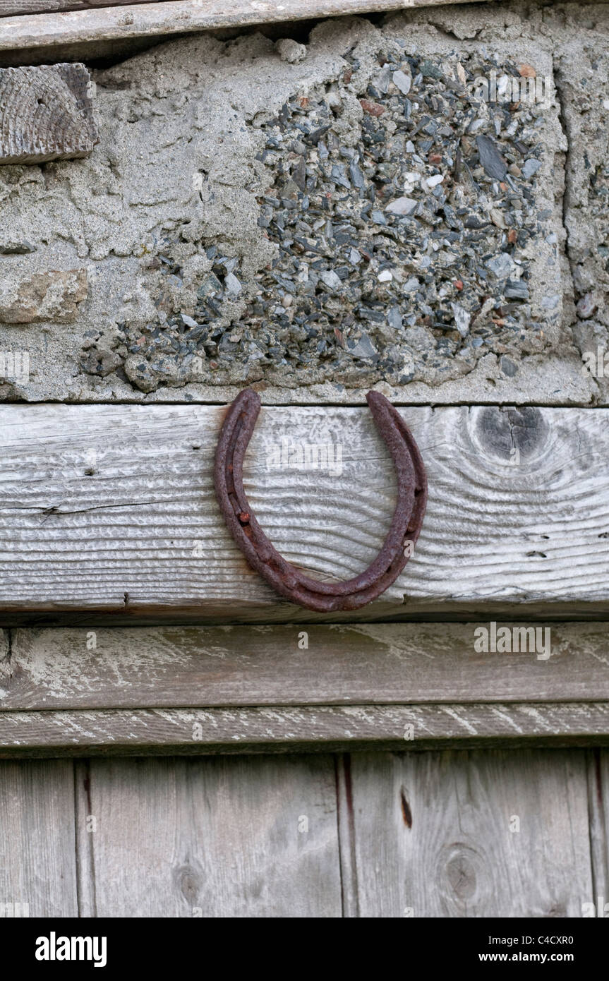 Horseshoe nailed to barn door, Shetland, Scotland, UK Stock Photo Alamy