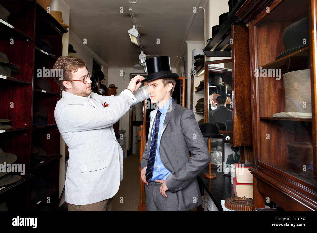 man being fitted for a Silk Top Hat at Lock & Co hatters, St.James's,  London. Photo:Jeff Gilbert Stock Photo - Alamy