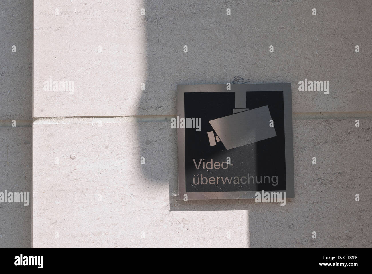Video surveillance camera sign, in German, with image of a video camera