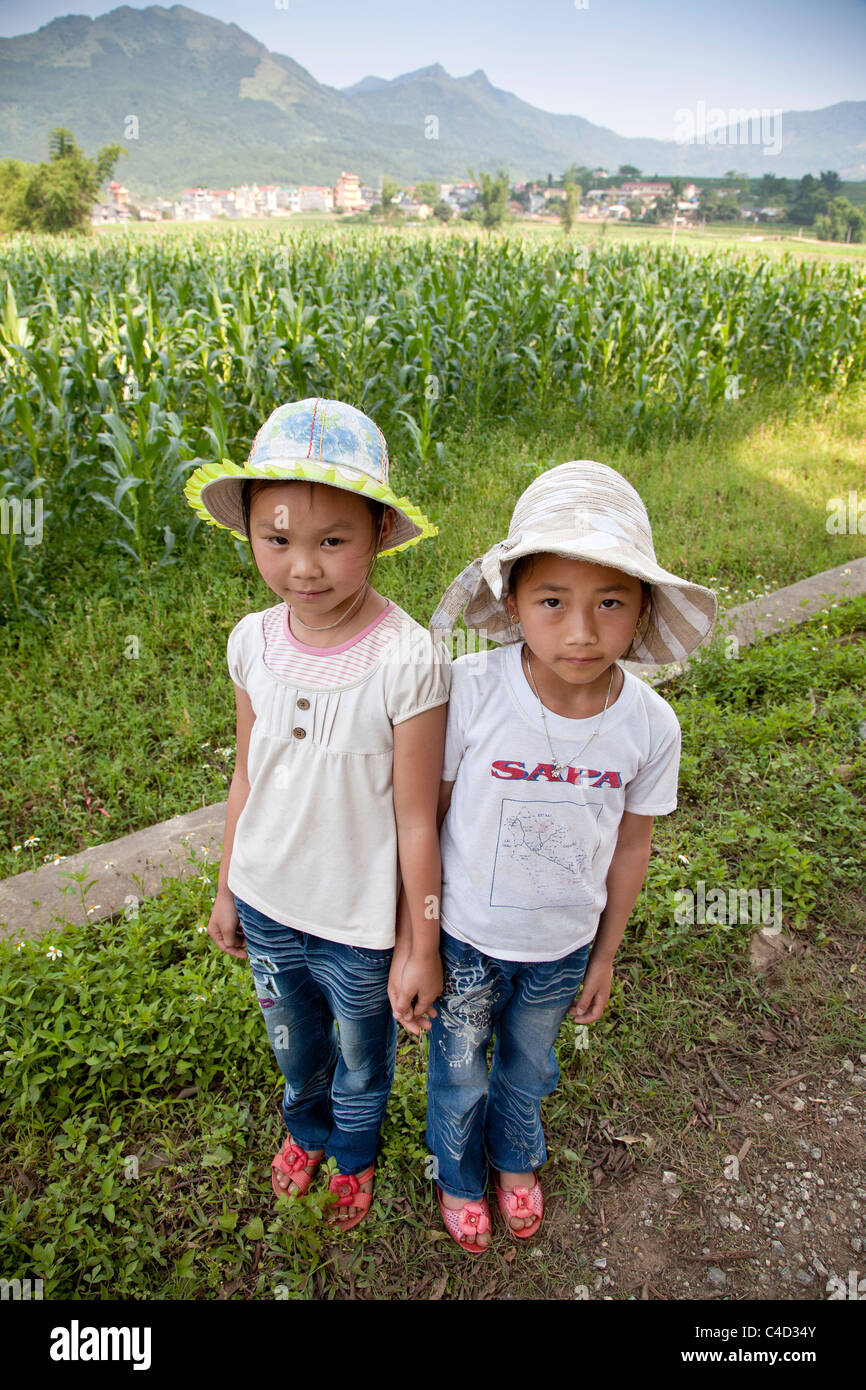 Two Vietnamese children in farmland North Vietnam Stock Photo