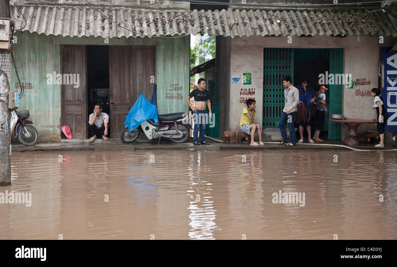 Flooded street scene North Vietnam Stock Photo
