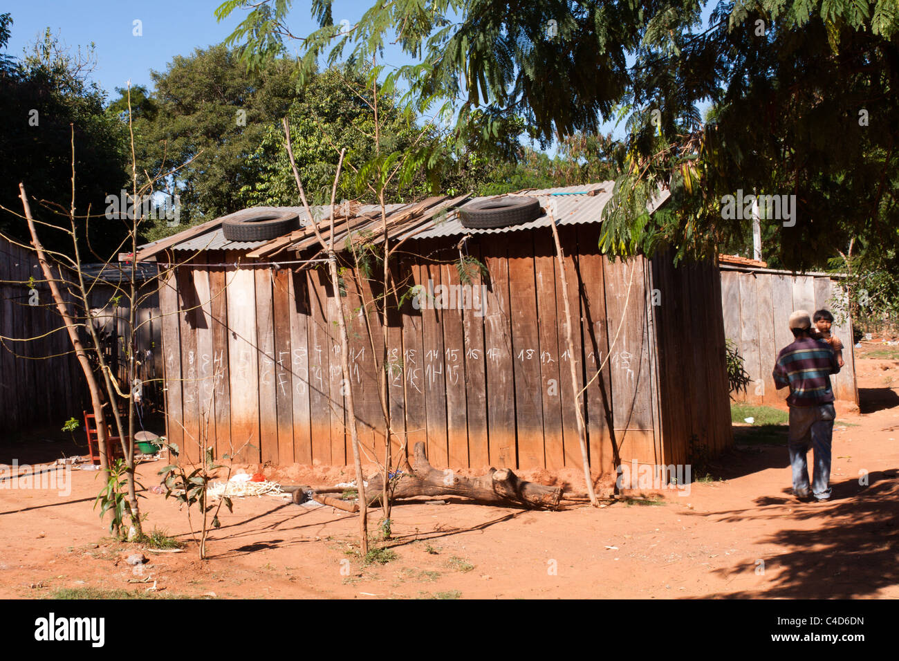Maka tribe timber made house, shacks, Maka tribe indigenous village on the outskirts of Asuncion, Paraguay Stock Photo