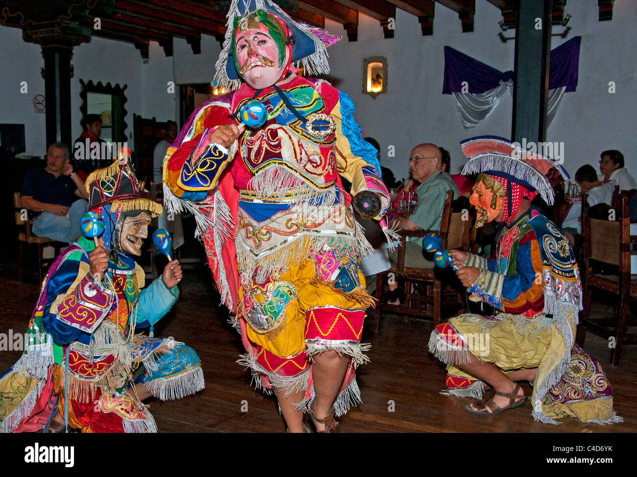 Mayan folkloric dancers in Antigua restaurant performing ceremony that mocked Spaniards and other Europeans Stock Photo