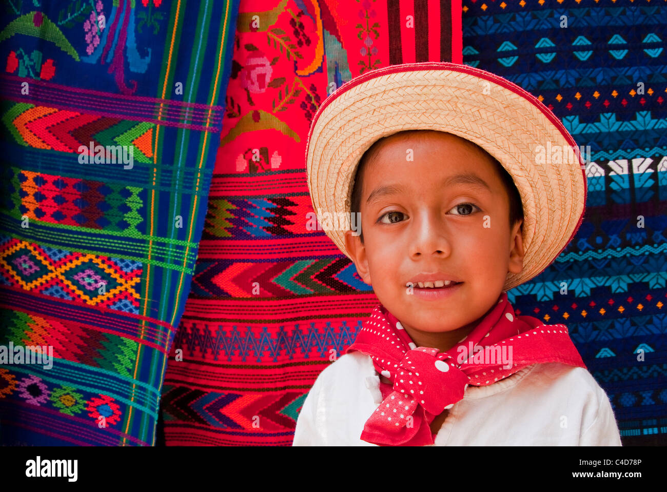 Kindergarten age Mayan boy at village market near Antigua. Stock Photo