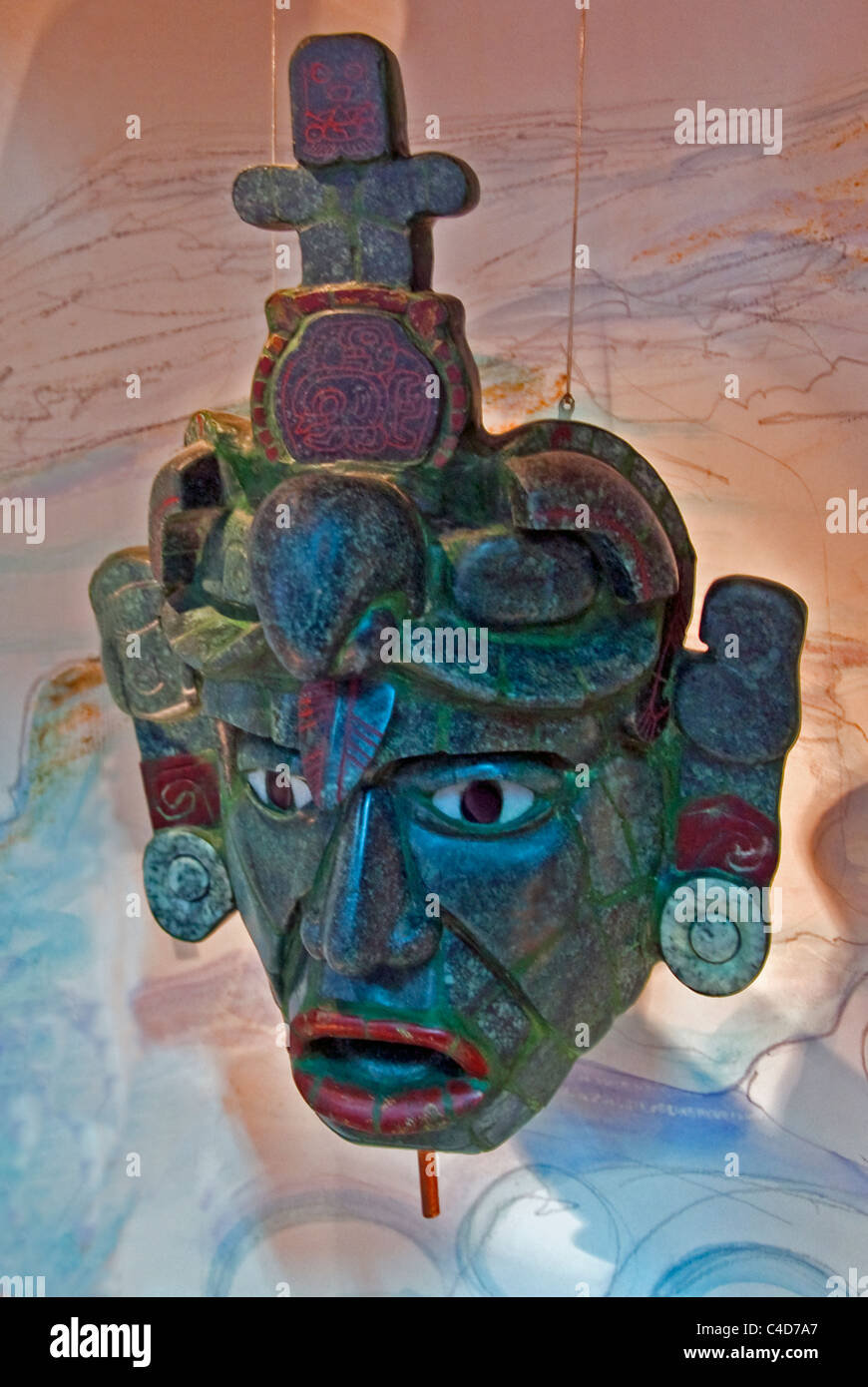 Replica of Mayan jade mask from Tikal tomb, found in 174 pieces, on