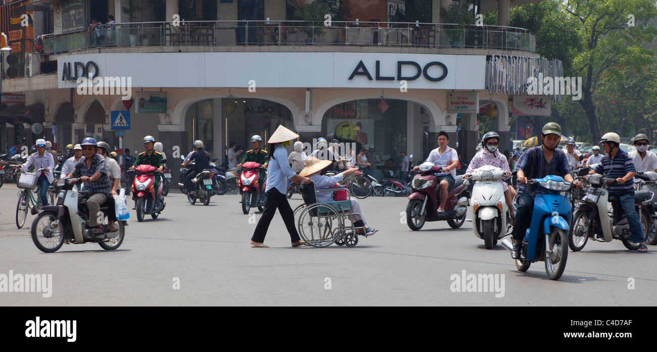 Chaotic travel progress, North Vietnam, small motorbikes are very popular here Stock Photo