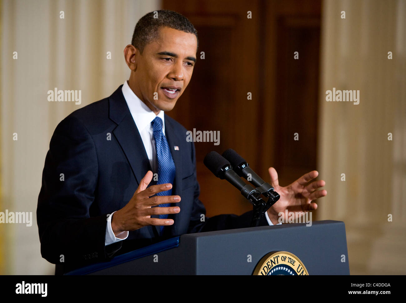 President Barack Obama speaks in the East Room of the White House. Stock Photo