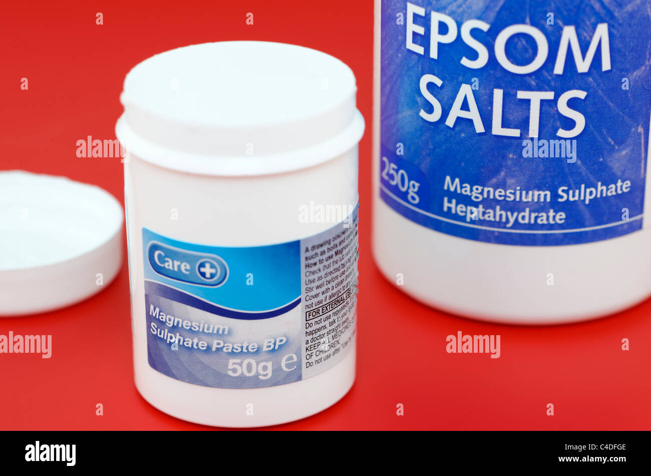 Two plastic tubs of Magnesium Sulphate paste BP and Magnesium Sulphate