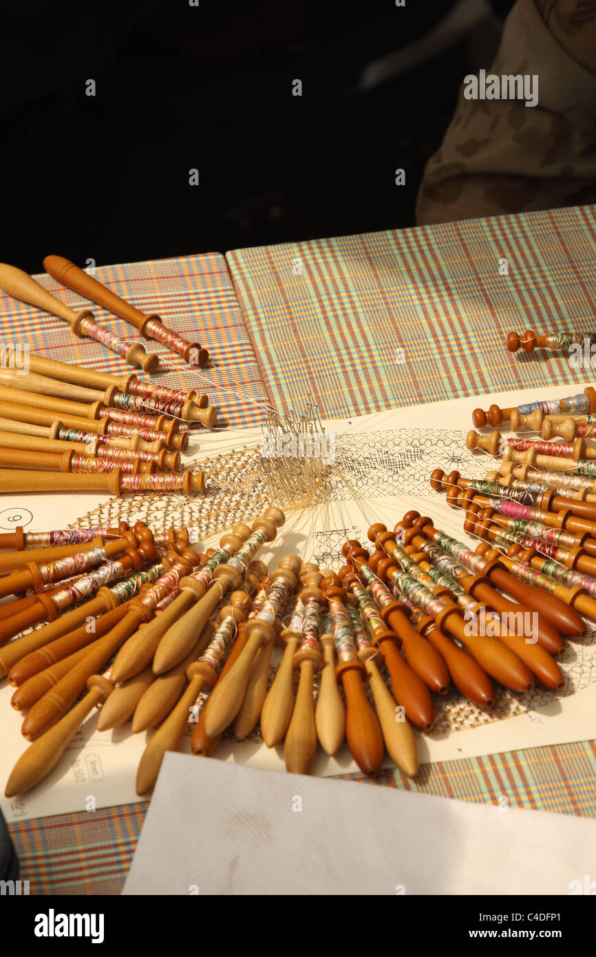 Process of lacemaking with bobbins Stock Photo Alamy