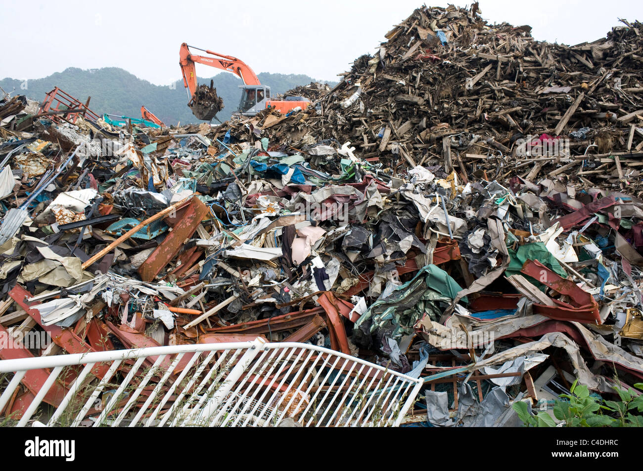 Three months after the magnitude 9 quake and tsunamis hit northeastern Japan, workers are still sifting through the debris Stock Photo